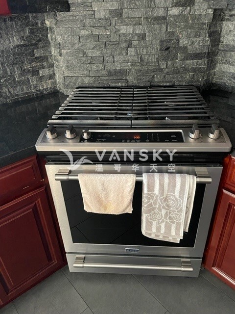 231030195519_Main Floor Stove.jpg